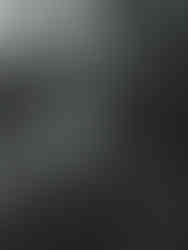 A black and white photo of a brie walking down the aisle, showcasing documentary wedding photography styles