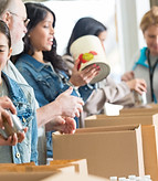 Volunteers Packing Food