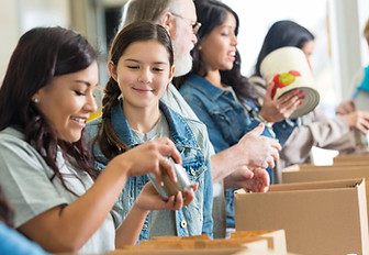 Volunteers Packing Food