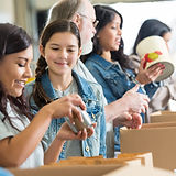 Volunteers Packing Food