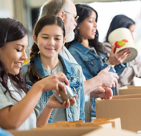 Volunteers Packing Food