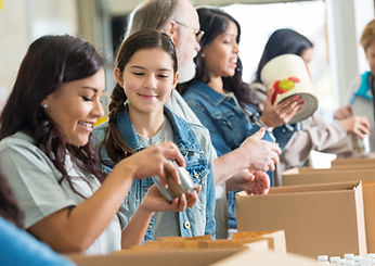 Volunteers Packing Food