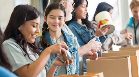 Volunteers Packing Food