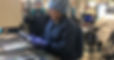 Industrial Assembly Ergonomics - lab technician assembles a medical device