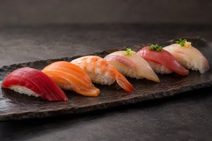 Illustration: Nigiri Selection. Fictional scene; not a photograph of this business or its actual menu.