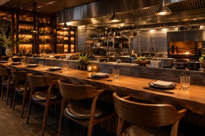 Illustration: Chef Counter. Fictional scene; not a photograph of this business or its actual menu.
