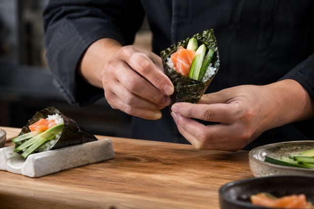 Illustration: Japanese & sushi. Fictional scene; not a photograph of this business or event.