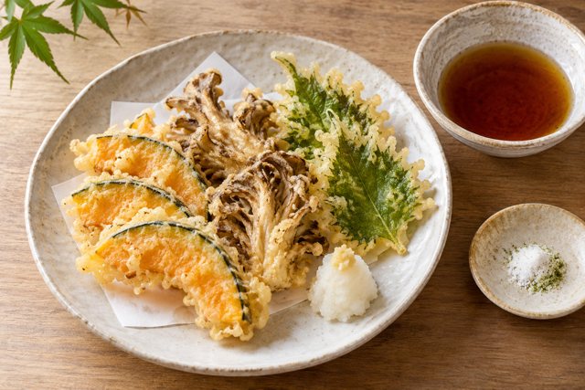 Illustration: Vegetable Tempura. Fictional scene; not a photograph of this business or its actual menu.