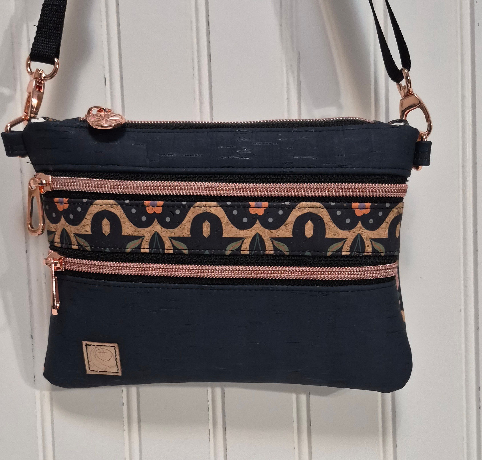 Black and Coral Print Cork Crossbody showing 2 outside zippers