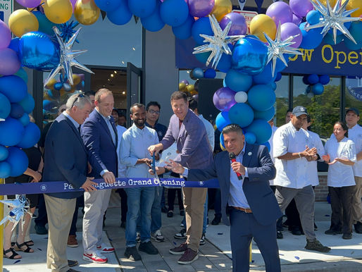 Paris Baguette CEO Darren Tipton cuts a ribbon at his company's new bakery in Yorktown Heights on August 8, 2025. Photo courtesy of Town of Yorktown.
