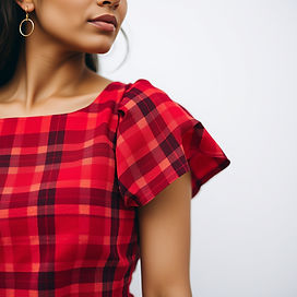 close up of a woman in a red checked dress.jpg