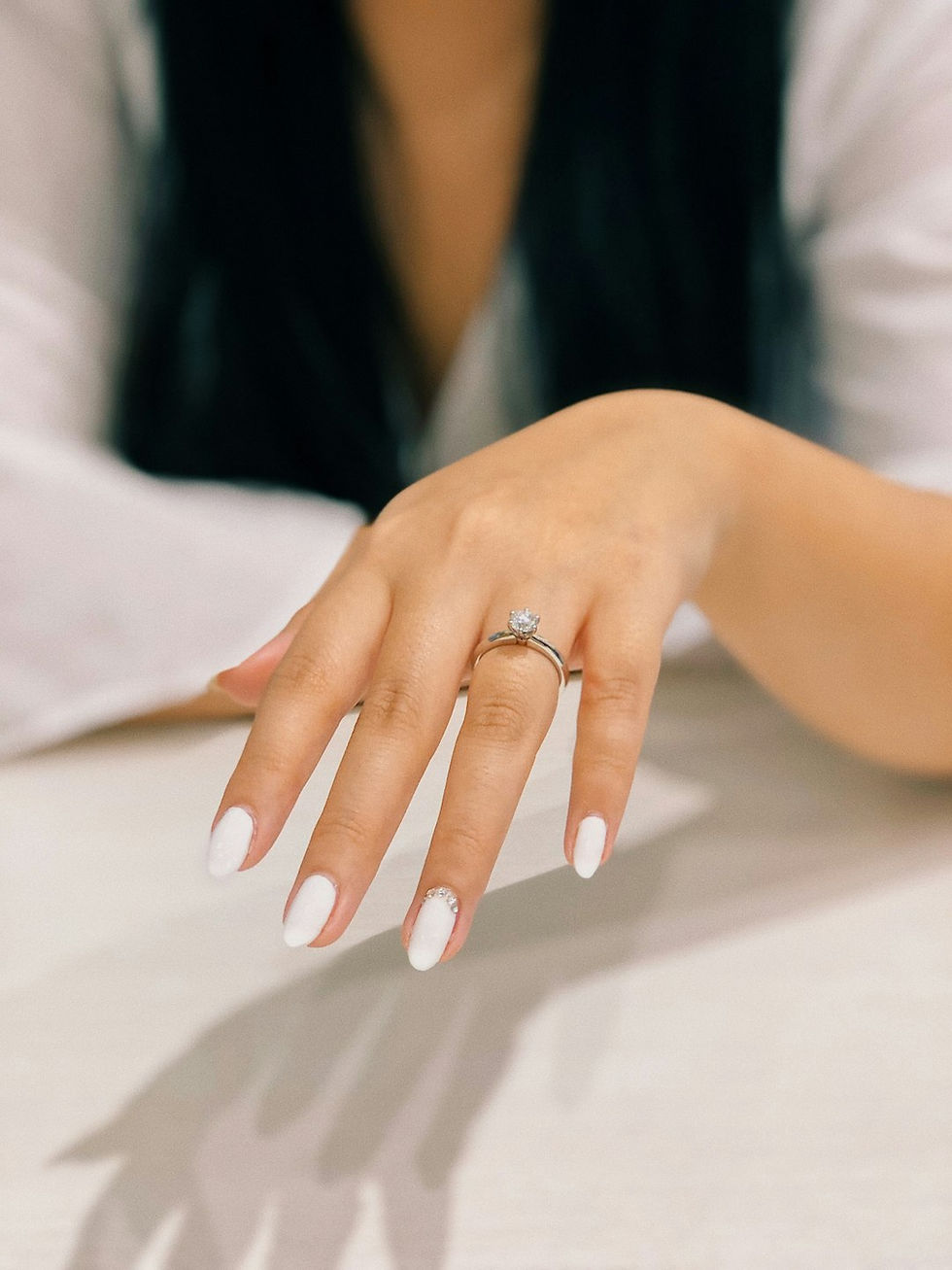 Woman receiving a non‑toxic Japanese gel manicure at Healthy Lifestyle Spa Lounge
