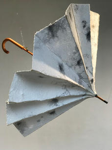 paper umbrella with stains