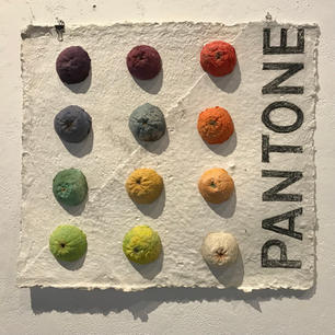 molded paper oranges in rainbow of colors