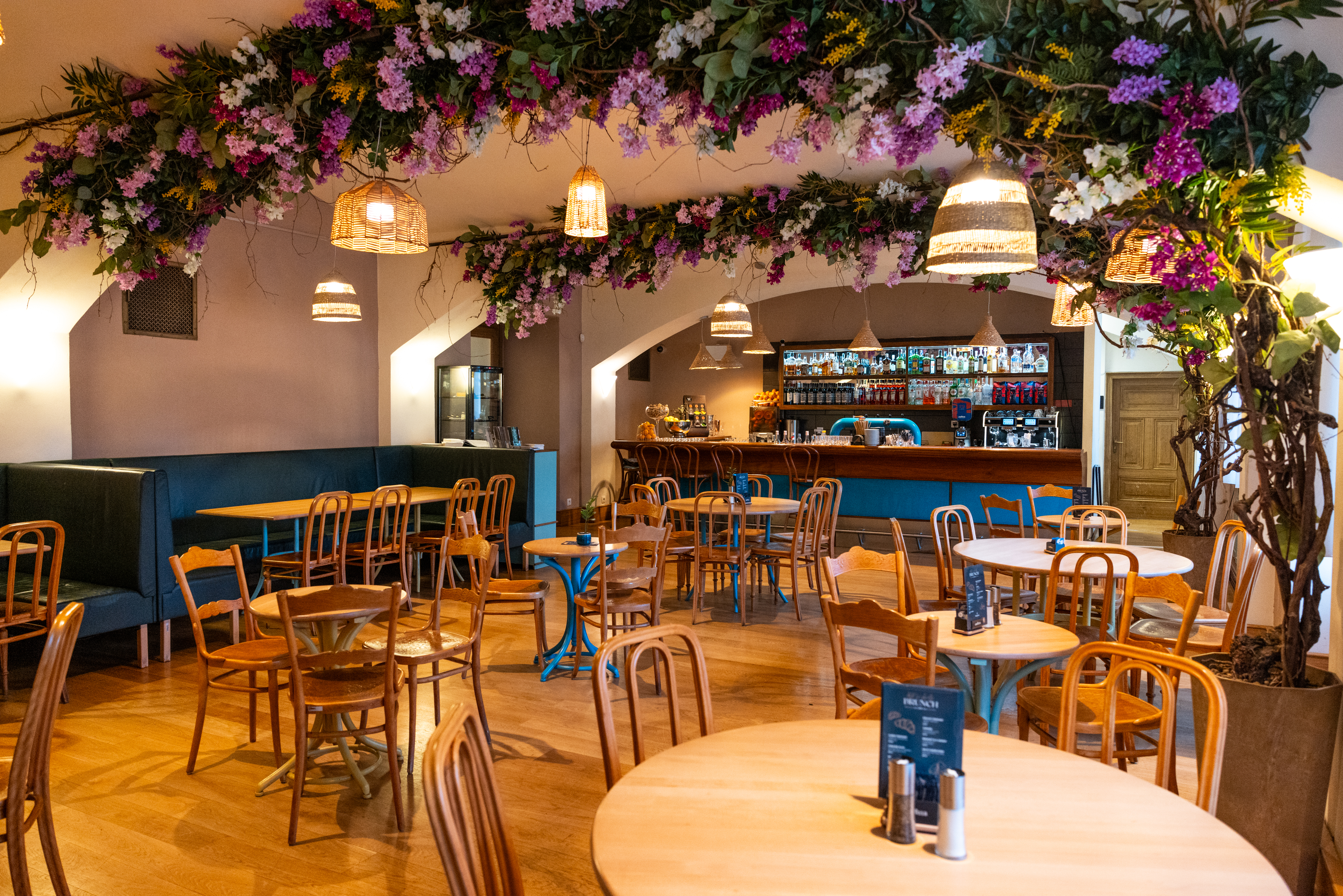 Interior of Turquoise Mediterranean Brasserie, Prague 1 — elegant dining room with Mediterranean décor