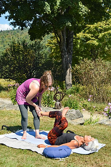 Assisted reclined pigeon