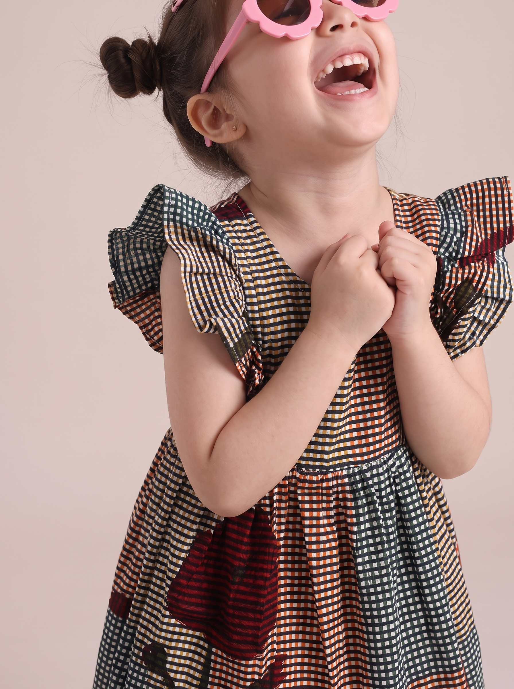 Girls casual wear frock in multicolor gingham floral print with ruffle sleeves