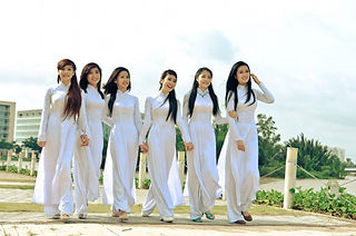 Simple but traditional white Ao Dais