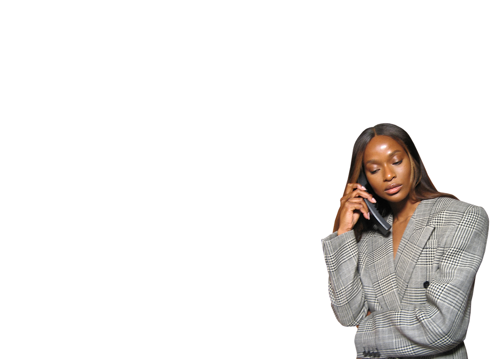 Dr Ewoma holding a phone