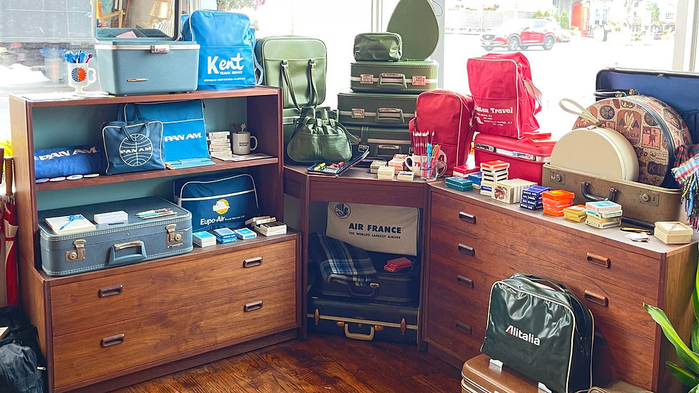 Vintage travel collection displayed at Sea City Vintage in Atlantic Beach Long Island New York