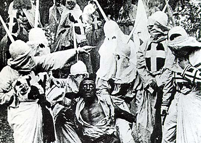 Walter Long as Gus in black face being