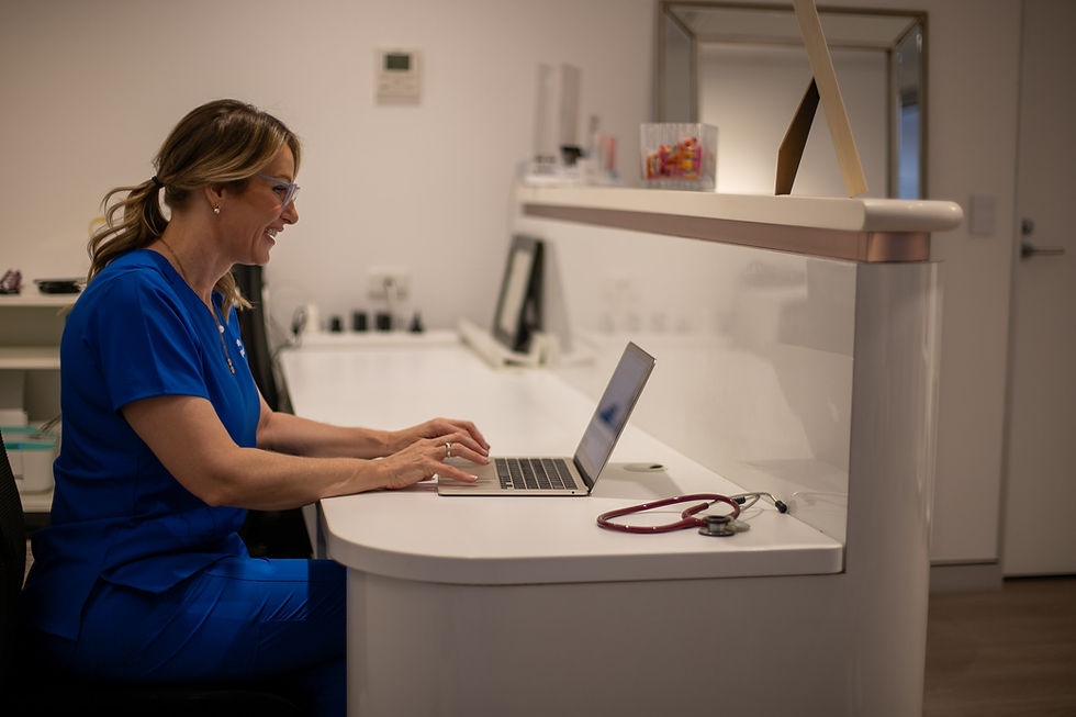 Healthcare professional conducting a telehealth consultation for aesthetic medicine treatment planning and patient care.