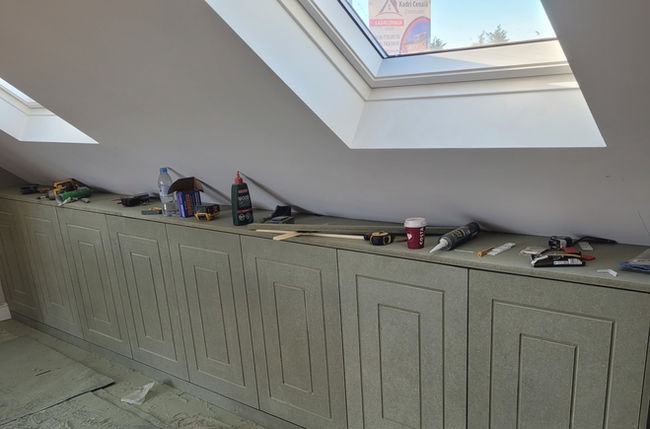 Custom-built attic storage units, tools