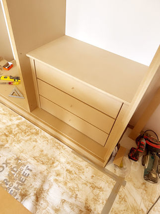 Custom-built three-drawer unit installation