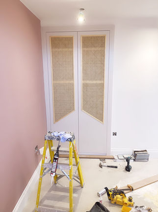 Custom built-in wardrobe installation in progress