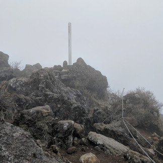 The top point on one peak of Mount Yufu in the fog