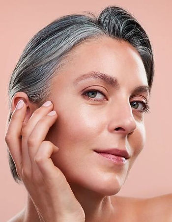 a lady in her fifties with firm, flawless skin.