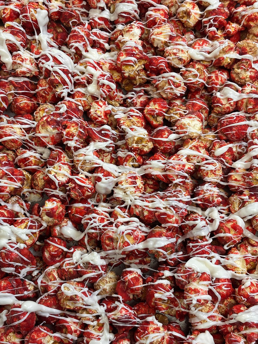 Velvet Midnight Butta gourmet popcorn inspired by classic red velvet cake with creamy sweetness and gentle cocoa notes.