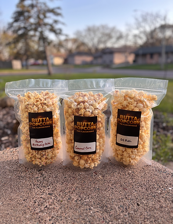 Hall Of Fame Collection displayed together Happy Birthday Cake, Caramel, and Dill Pickle in Butta Popcorn bags