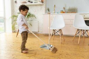 Home School Made Easy child-using-broom-300x200 Chart Your Child's Accomplishments