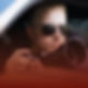 detective in a car window