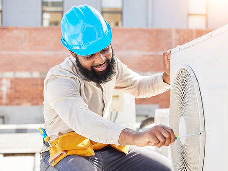 Man, technician or screwdriver for air conditioner on rooftop in the city for box or ac repair labo