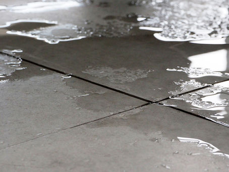 Wet floor close up. it can cause slippery by water.