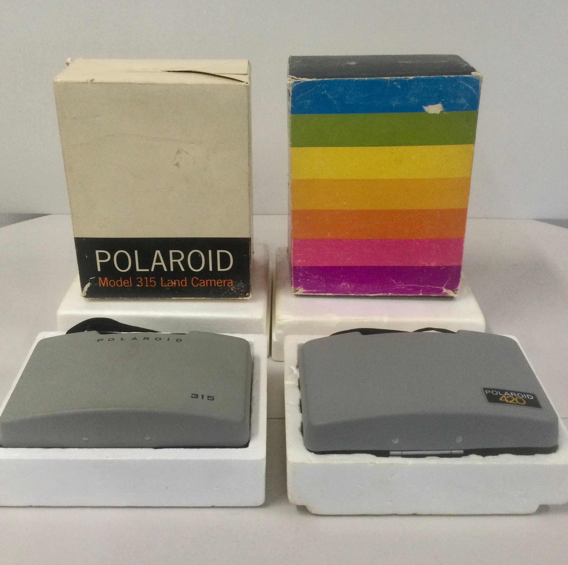 Two Polaroids in box (420, 315)