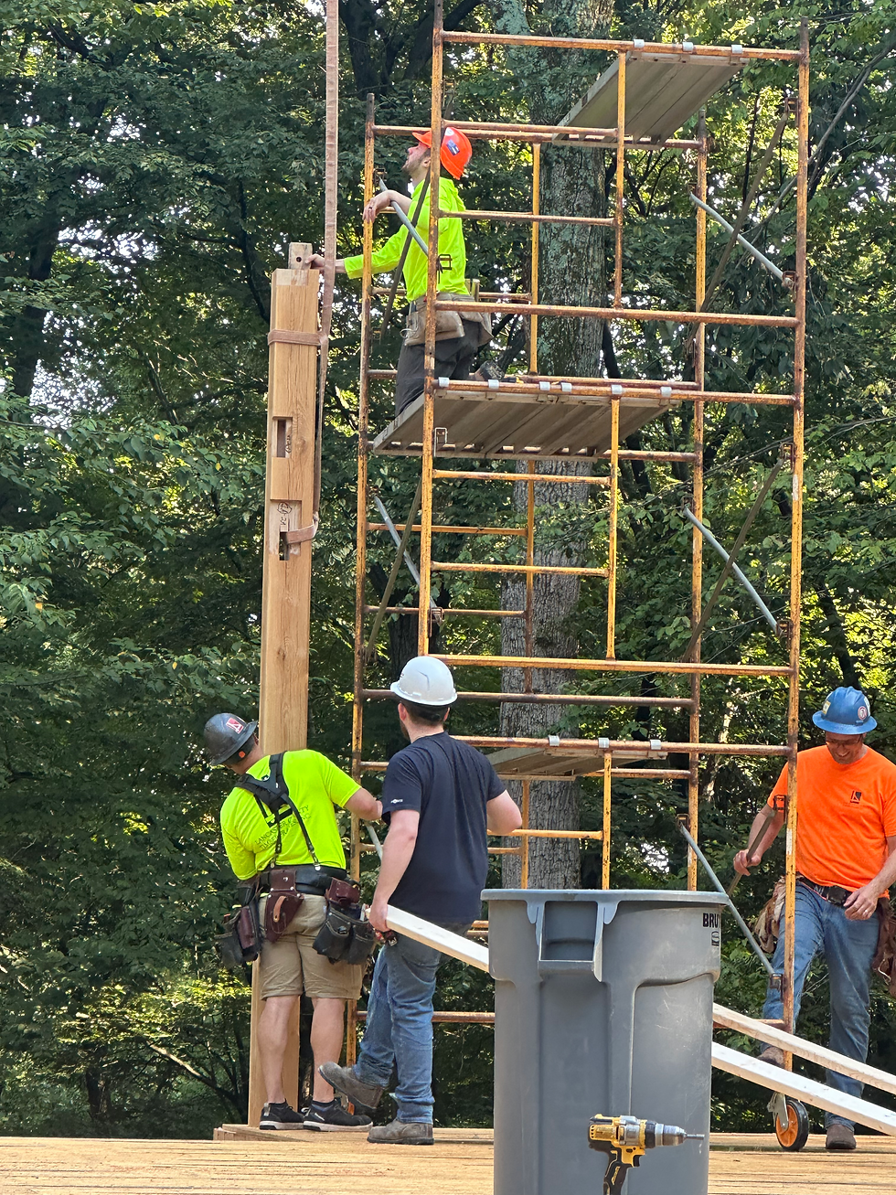 The first post goes up. A crew of five from Lancaster County Timber Frames is working today, including Josh Coleman, who helped raise our original timber frame in 2002.