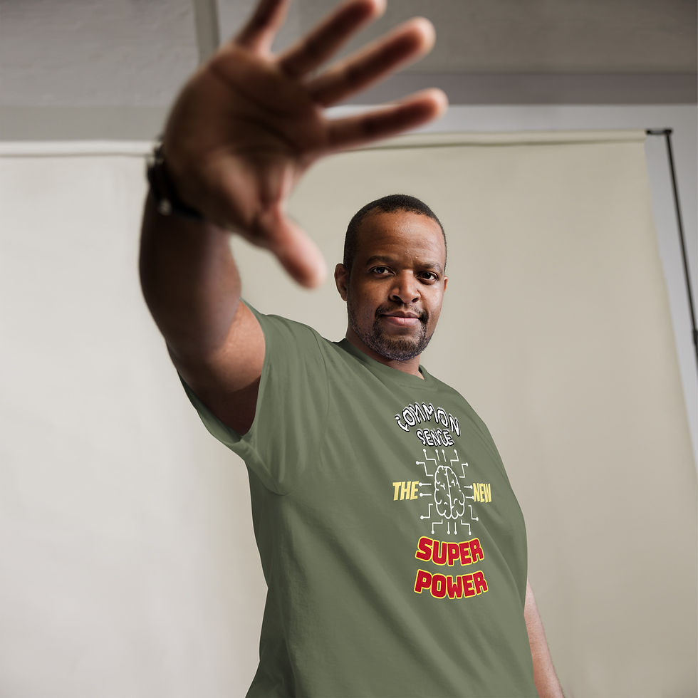 サムネイル： Man reaching out, wearing a t-shirt with text: 