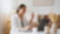 Female therapy patient in NYCC having online session on laptop