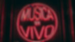 A bright red neon sign that says "MÚSICA EN VIVO" inside a circle.