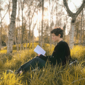 The Living Girl Reading in a Landscape