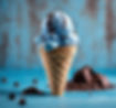 Blue Ice cream with chocolate chips one scoop in a cone.jpg