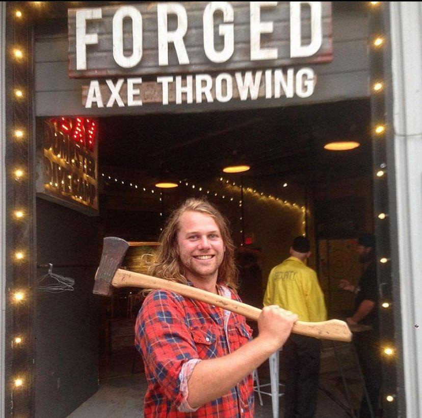boy, with axe at Forged Axe Throwing Whistler