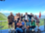 Group picture on Ha Giang Loop, with hills in the background