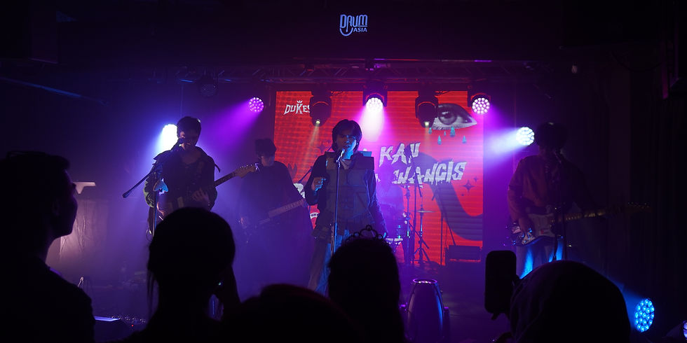 The band performing one of their hits, 'Bila Kau Datang Menangis'. (Photo Credits: Aini Wajihah)