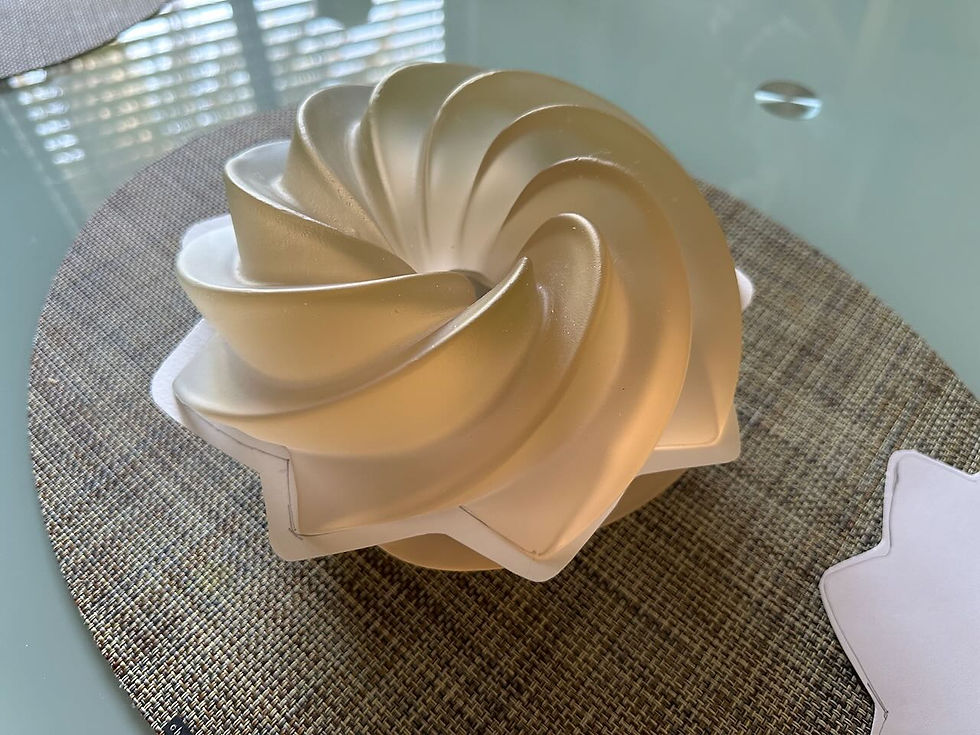 Cutting a pattern and placing it between the castings for the unifying element.