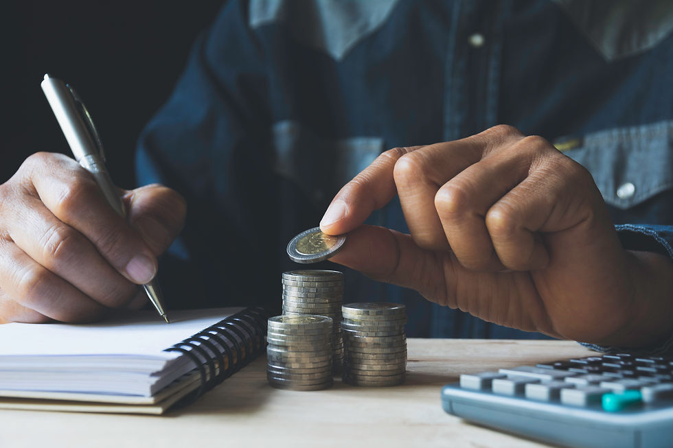 hand-drop-coin-with-money-coin-stack-growing-business.jpg