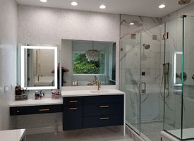 A Dream Bathroom Makeover Featuring Glass Shower Doors & a Makeup Counter